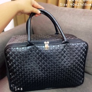 CODE O9F LEATHER TRAVEL BAG BATIK TRAVEL BAG