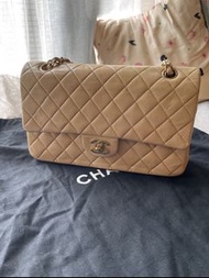 sales…Chanel beige medium classic flap handbag