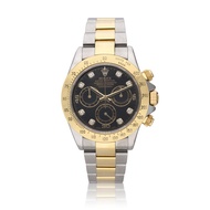 Rolex Daytona Reference 116523, a yellow gold and stainless steel automatic wristwatch with chronograph, Circa 2006