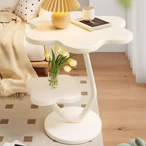 A few cream windblown hair and a few small coffee tables in the living room, a small dining table in