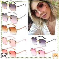NEXTMY Square Rimless Sunglasses for Women Tinted Transparent UV400 Frameless