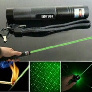 Green laser pointer 303 with white box