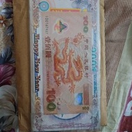 千禧年2000塑料龍鈔壹佰元，數字冠UNC