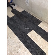 Dark grey long tile carpet