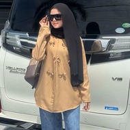 Blouse coquette viral