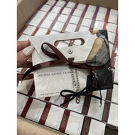 ENTROPY LIPSTICK PAPER BAG WITH CHARM