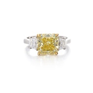 Platinum, Gold, 2.86ct Radiant Cut Fancy Vivid Yellow Diamond and Diamond Three Stone Ring