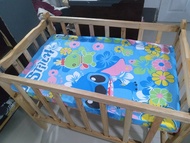 Wooden crib adjustable with uratex