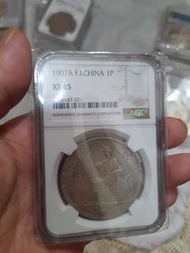 一個坐洋一圓