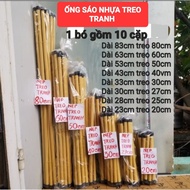1 bundle of 10 Plastic flutes to hang pictures in many sizes from 23cm to 83cm. Calligraphy paper ha