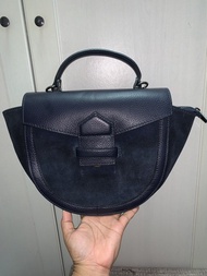 Vera Pelle half moon bag