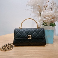 CHANEL 香奈兒翻蓋式連琺瑯手挽手機鍊帶包包PHONE FLAP WITH ENAMEL HANDLE LAMBSKIN