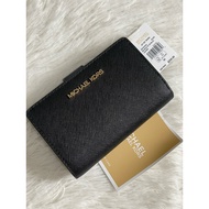 MK MEDIUM WALLET - - US BOUGHT