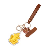 SK Jewellery Ganesha Blessings 999 Pure Gold Keychain Collectible in Brown Tag