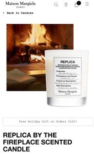 maison margiela replica by the fireplace candle