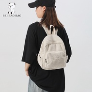 Bei Bao กระเป๋าเป้ผู้หญิงชุดลูกฟูกสีทึบลำลองกระเป๋านักเรียนใส่ไปโรงเรียนเป้สะพายหลังสำหรับเดินทาง