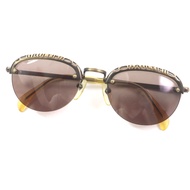 品相極佳：Jean-Paul Gaultier 56-3175 復古款金色淨CLEAR黃色半框太陽眼鏡，日本製造，鏡框上刻有品牌標誌。