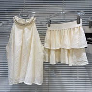 เสื้อกั๊กเสื้อกล้ามคล้องคอประดับไข่มุกแขนกุดชุดสองชิ้นกระโปรงจีบแบบสั้น GR143เสื้อผ้าผู้หญิงฤดูร้อน