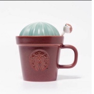 Starbucks cactus mug with hedgehog stirrer
