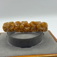 Drop Bracelet Or Honey Jade Carved With Flowers Around The Ring With A Bare Shape Size 61.9 Mm E591