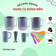 Measuring spoon and cup with graduations. Capacity from 50ml to 1 liter. PP plastic material