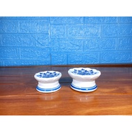 Low candlesticks Worship Items with Lotus motifs in blue glaze and Bat Trang ceramics.