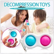 simple dimples fidget release stress keychain toy