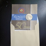 old coin in blister pack