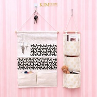 KIMHOME cotton linen multi-layer hanging storage bag wall hanging wardrobe organizer with pocket war