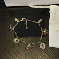 C0a€h Charmed Bracelet