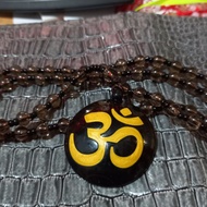 Biomagnetic health necklace to improve circulation symbol Om