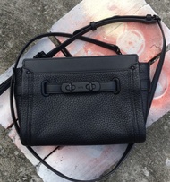 Coach wrislet black swagger 20 preloved