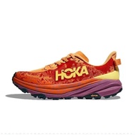 Lightweight Hoka Speedgoat 6 Trail shoes ideal for trail running.
