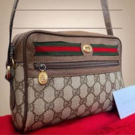 (Gucci) 相機肩包雪利線 GG Supreme 互鎖斜背包皮革