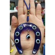 blue evil eye horseshoe pangsabit hanging on door