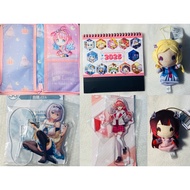 Official Hololive wafer card and assorted Hololive merch