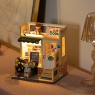 Rolife Sakura Densya 3D ไม้ DIY ขนาดเล็กหนังสือตุ๊กตา1:24ชุดประกอบโมเดลนุ๊กพร้อมชั้นวางของเอนกประสงค์ไฟ LED สำหรับเป็นของขวัญผู้ใหญ่