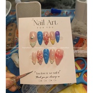 Super pretty embossed flower beach nails