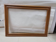 กรอบรูปติดผนัง กรอบรูปไม้สักทอง ****กรอบรูปเปล่า***สำหรับใส่รูปภาพขนาด20*30นิ้ว (ขนาดภายนอก 62