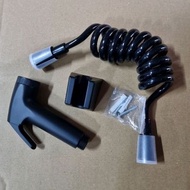 Matt black bidet spray gun set with telephone cord style rubber hose and bidet holder