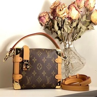 Side trunk leather handbag