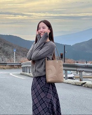 Rally The Bag Whisper - กระเป๋าหนังทรง Bucket ลายโลโก้ แท้💯พร้อมส่ง