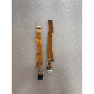 Removed original oppo F5 charging port assembly (as pictured)