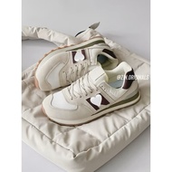 574 v2 classic purple cream sneaker