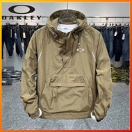 Oakley Men's Laid-Back Half-Zip Windbreaker Jacket Featuring Spacious Pockets, Removable Hood, Pullo