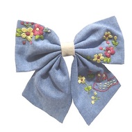 Hand-embroidered hair bow, blue color, alternating color in the middle with cream color, cotton fabric, bird and flower lover pattern design