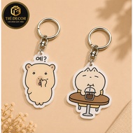 Innocent peach orange guinea pig keychain fake without understanding