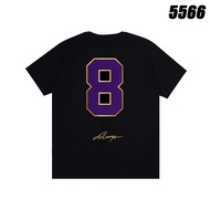 Black T - shirt with purple number 8 and signature