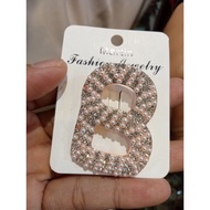 Pearl microphone button brooch