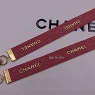 สายคล้องหน้ากาก สายคล้องแมสชาแนล Chanel Ribbon MASK STRAPS ริบบิ้นแบรนด์เนมแท้ สีแดงลายทอง บริการเก็บเงินปลายทาง